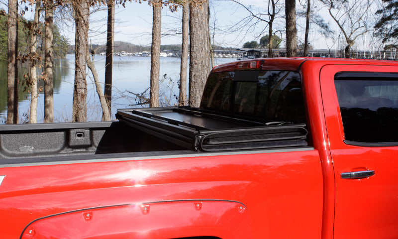 Lund 02-17 Dodge Ram 1500 Fleetside (8ft. Bed) Hard Fold Tonneau Cover - Black