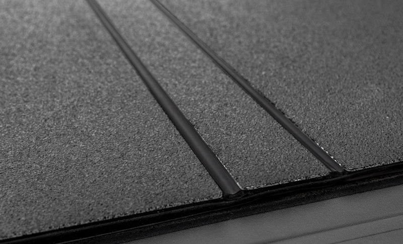Access LOMAX 22-24 Toyota Tundra 6ft 6in Bed Tri-Fold Cover Black Urethane Finish