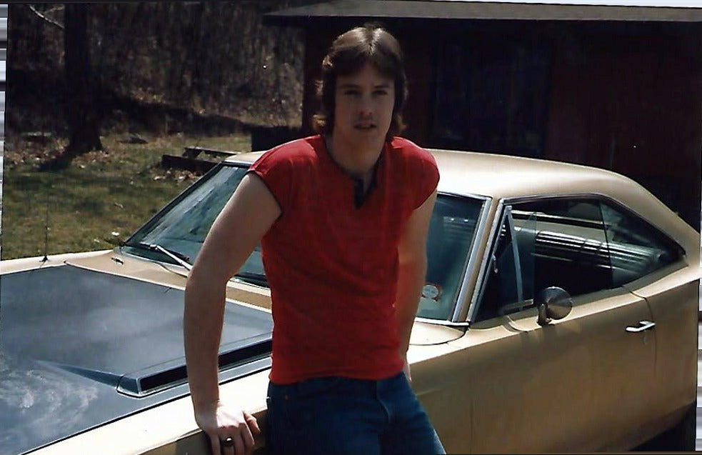 Brian Fish with his car